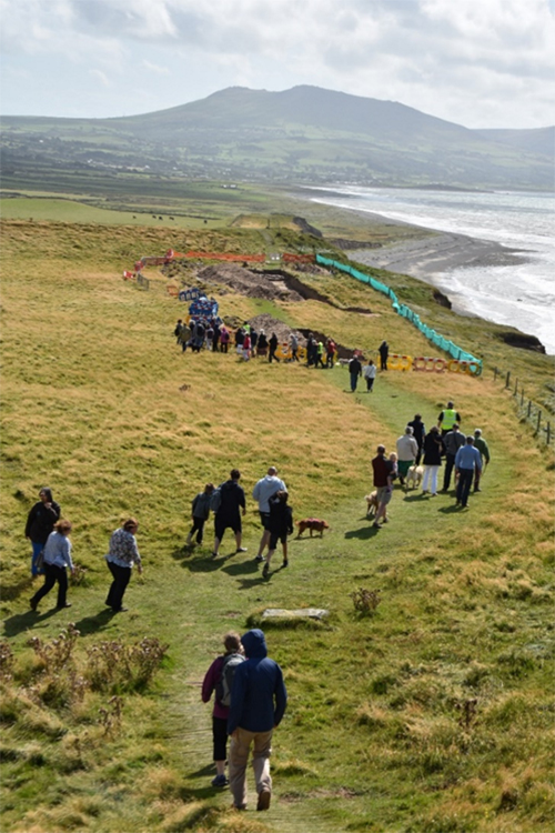 CHERISH open day visitors on a green cliff top